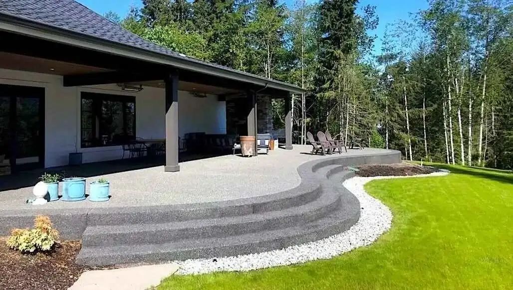 Beautiful exposed aggregate concrete patio showcasing natural stone finish - Bellevue, WA