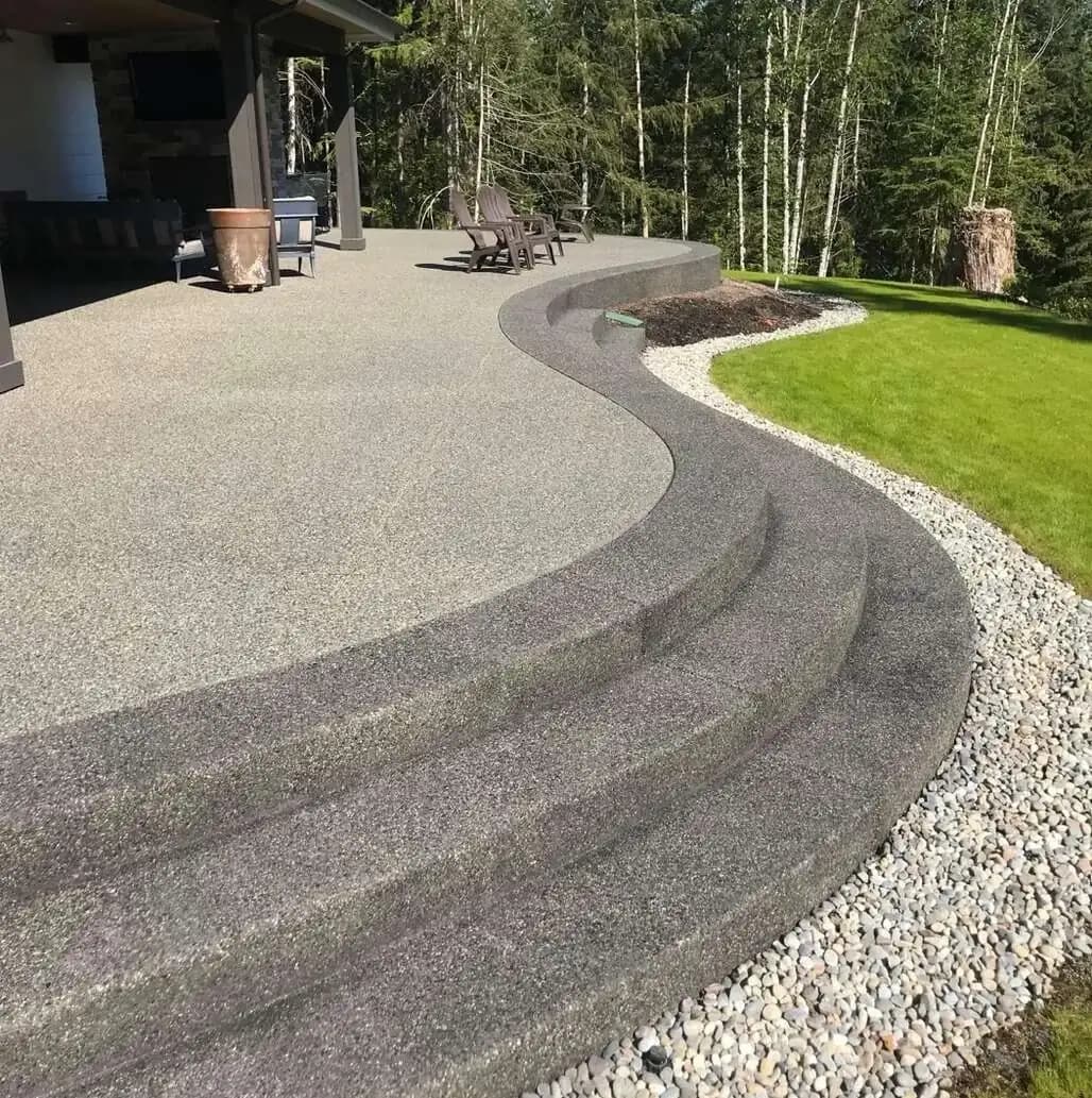 Professional concrete patio with exposed aggregate finish in Tacoma, WA